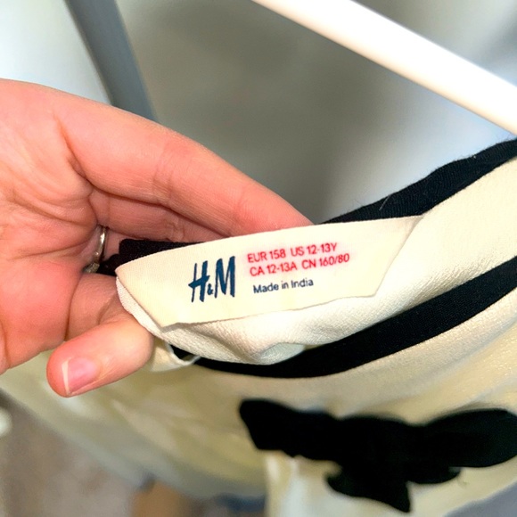 Juniors cream sheer blouse with black bow - Picture 2 of 3